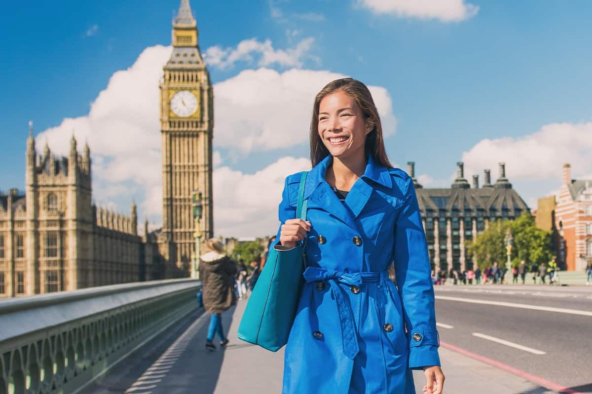 A child holding their British registration certificate at a citizenship ceremony - registration is the route for children and specific eligible adults, distinct from adult naturalisation.